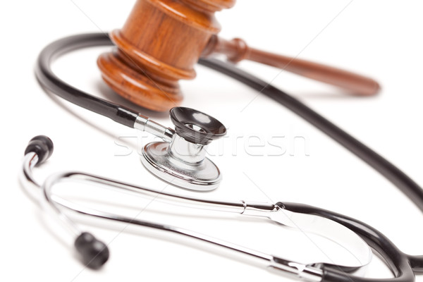 Black Stethoscope and Gavel on White Stock photo © feverpitch