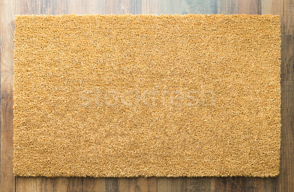Blank Home Sweet Home Welcome Mat On Wood Floor Stock photo © feverpitch