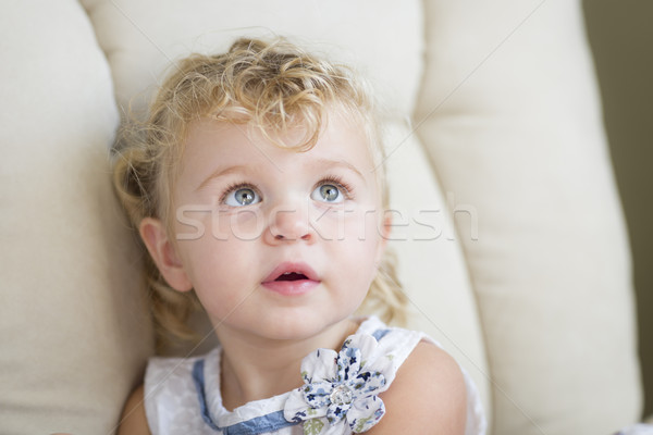 Imádnivaló szőke hajú kék kislány szék ül Stock fotó © feverpitch