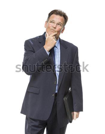 Businessman With Hand on Chin and Looking Up and Over Stock photo © feverpitch