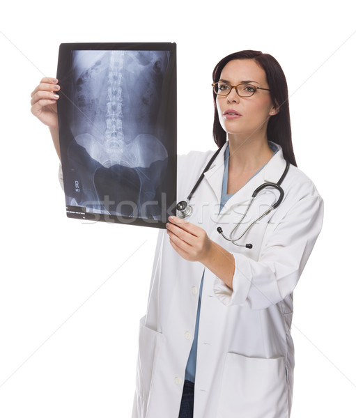 Mixed Race Female Doctor or Nurse Reviewing X-ray on White Stock photo © feverpitch