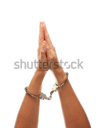Handcuffed Woman Raising Hands in Air on White Stock photo © feverpitch