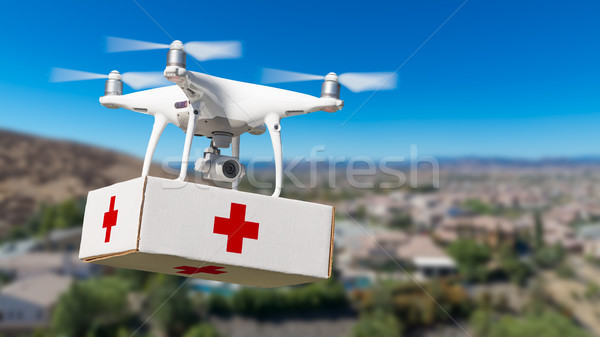 Unmanned Aircraft System (UAS) Quadcopter Drone Carrying First A Stock photo © feverpitch