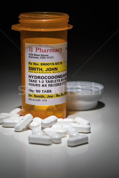 Hydrocodone Pills and Prescription Bottle with Non Proprietary L Stock photo © feverpitch