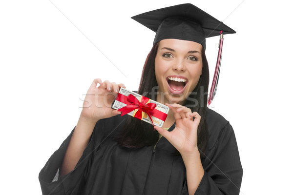 Female Graduate Holding Stack of Gift Wrapped Hundred Dollar Bil Stock photo © feverpitch