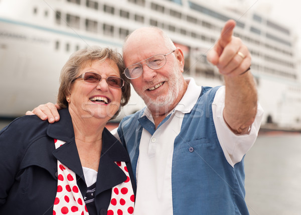 Senior Couple On Shore in Front of Cruise Ship Stock photo © feverpitch