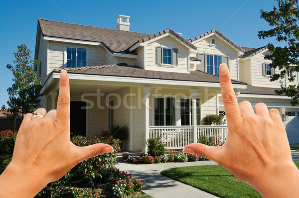Female Hands Framing Beautiful House Stock photo © feverpitch