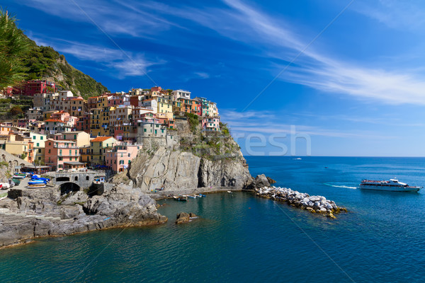 Village of Manarola with ferry, Cinque Terre, Italy Stock photo © fisfra