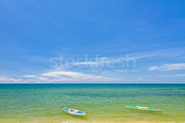 Sand beach with canoes in Phu Quoc close to Duong Dong, Vietnam Stock photo © fisfra