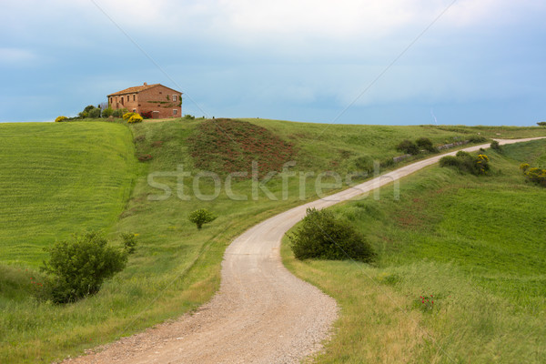 Tuscany farmhouse with lightning at horizon, Pienza, Italy Stock photo © fisfra