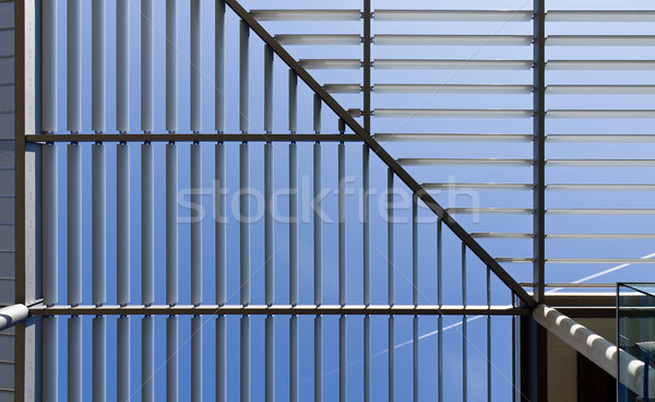 Roof made of steel with column, lights and shadows Stock photo © fisfra