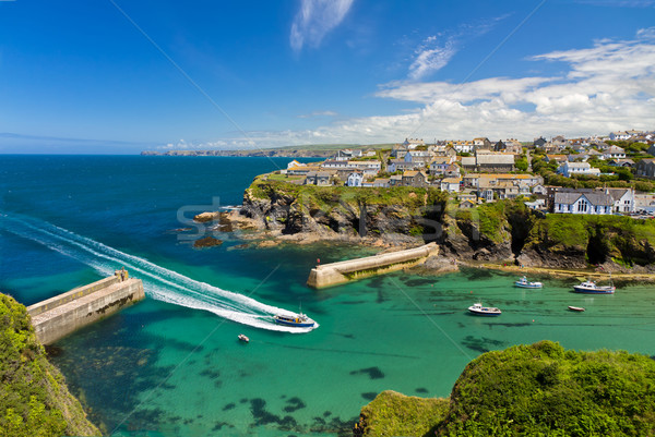 Cove and harbour of Port Isaac with arriving ship, Cornwall, England Stock photo © fisfra