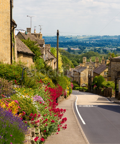 Cotswolds village Bourton-on-the-Hill with flowers, UK Stock photo © fisfra