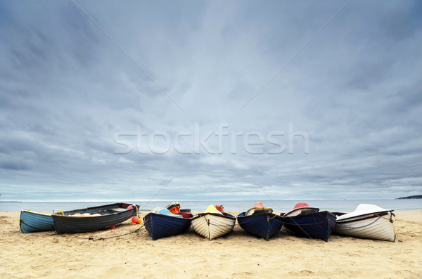 Halászat hajók tengerpart égbolt kék homok Stock fotó © flotsom