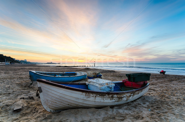 Blue & White Boats on Beach at Sunrise Stock photo © flotsom