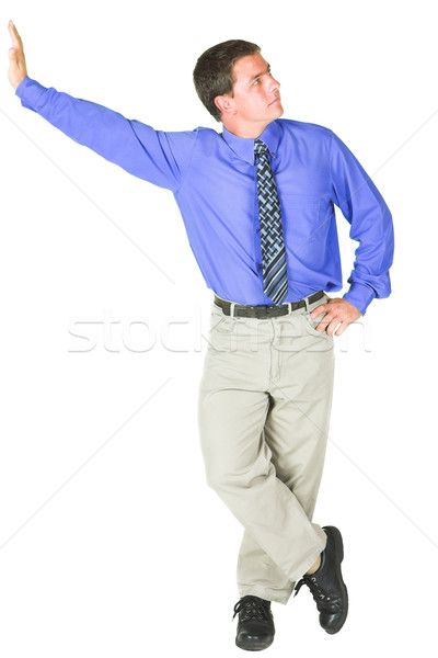 Young adult businessman standing against copy space Stock photo © Forgiss