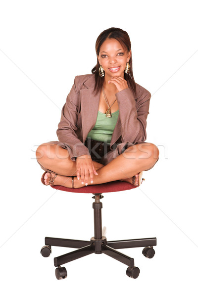 African businesswoman on office chair Stock photo © Forgiss