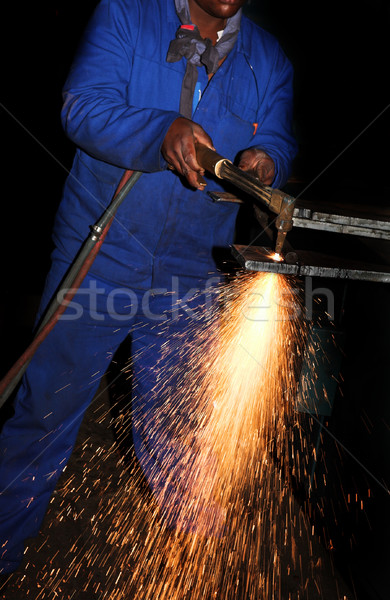 Plasmă lucrător albastru siguranţă lucru concentra Imagine de stoc © Forgiss