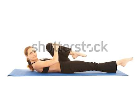 Pilates testmozgás fitt fiatal barna hajú oktató Stock fotó © Forgiss