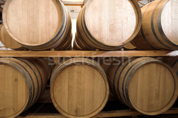 Oak barrels maturing red wine and brandy Stock photo © Forgiss