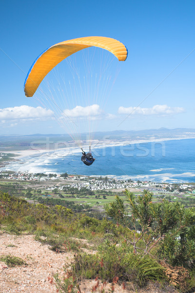 Paraglider ridge soaring next to the mountain Stock photo © Forgiss