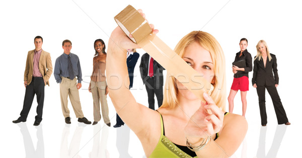 Blonde businesswoman standing in front of a business people grou Stock photo © Forgiss