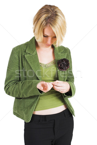 [[stock_photo]]: Femme · d'affaires · vert · veste · regardant · vers · le · bas · mains · rouge