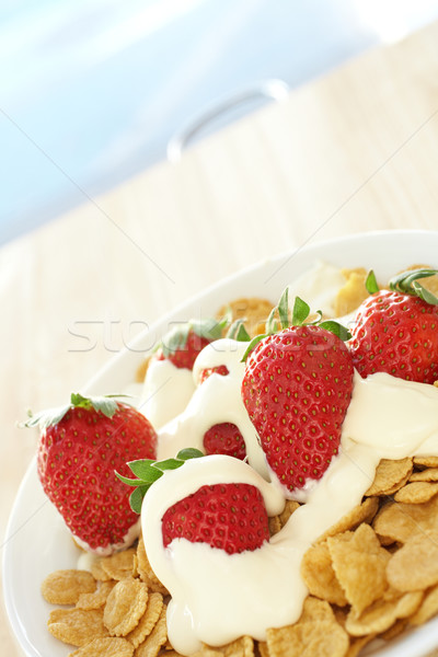 Breakfast cereal with strawberries and cream Stock photo © Forgiss