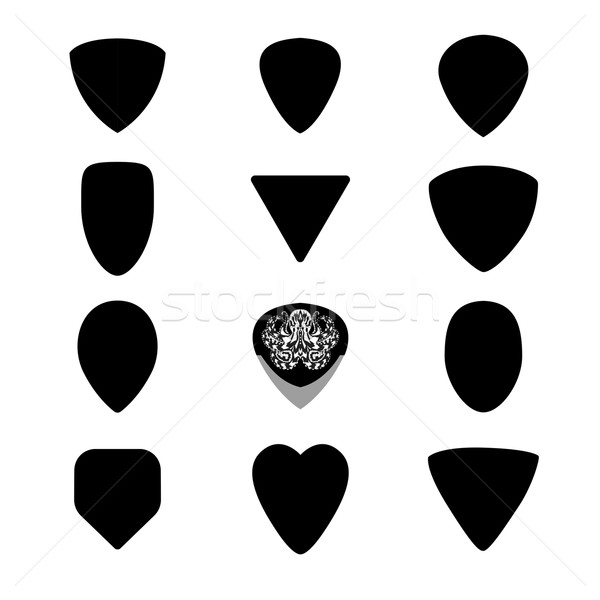 Guitar picks. Different types of musical plectrum silhouette Stock photo © Fosin