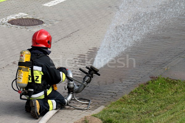 Brandweerman water oefening Stockfoto © Fotaw