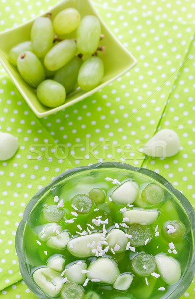 Stock photo: Delicious fruit jelly grapes dusted coconut shreds