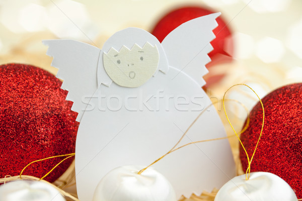 Christmas card with paper angel and balls Stock photo © fotoaloja