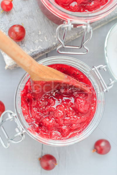Jars gooseberry jam wooden table Stock photo © fotoaloja