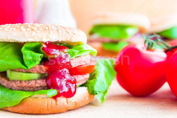 Appetizing big cheeseburger fresh lettuce cucumber Stock photo © fotoaloja