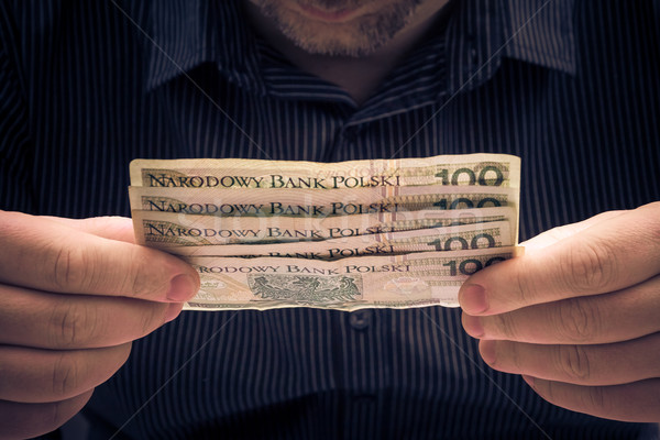 Polish banknotes hands man Stock photo © fotoaloja