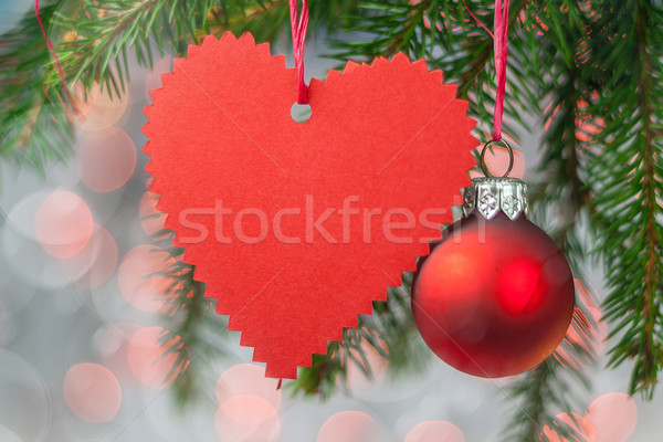 Christmas card with heart, ball and spruce twig Stock photo © fotoaloja