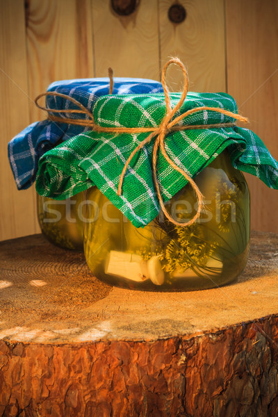 Pickled cucumbers jars wooden table Stock photo © fotoaloja