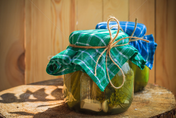 Pickled cucumbers jars wooden table Stock photo © fotoaloja