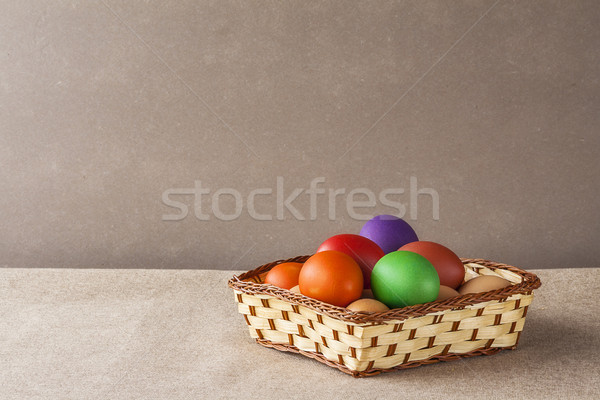 Színes húsvéti tojások kosár húsvét tavasz tojás Stock fotó © fotoaloja