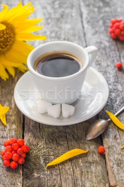 Kávéscsésze fekete fa deszka barna napraforgó fehér Stock fotó © fotoaloja