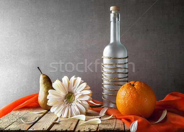 Still life white gerbera bottle fruits Stock photo © fotoaloja