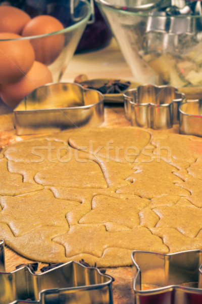 Christmas glazed biscuit shapes imprinted dough Kitchen table wi Stock photo © fotoaloja