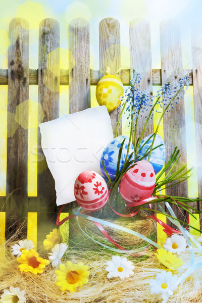 Art easter background with fence, eggs, spring flowers, blank ca Stock photo © fotoaloja