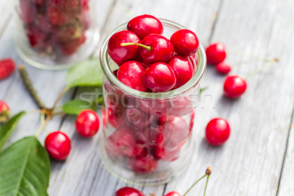 Glasses full freshly picked cherries raspberries Stock photo © fotoaloja