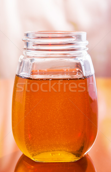 clear sweet tasty honey in a jar Stock photo © fotoaloja