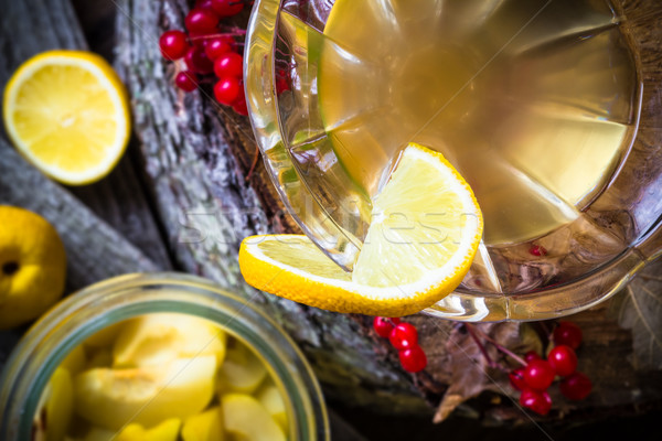 alcohol quince liqueur sliced fruit jar wooden cups Stock photo © fotoaloja