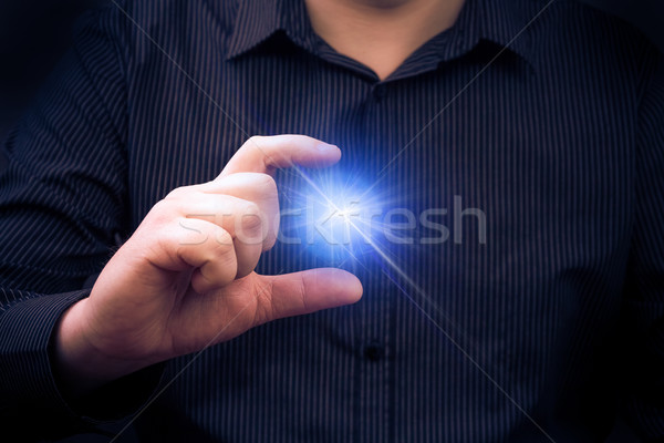 Poder mano hombre luz signo energía Foto stock © fotoaloja