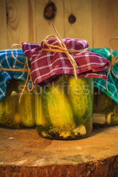 Stock photo: Jars pickled gherkins wooden table