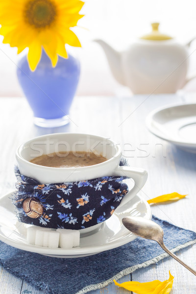 Stock photo: coffee cup black wooden board brown white jug milk sunflower