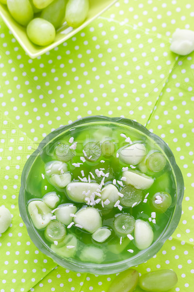 Delicious fruit jelly grapes dusted coconut shreds Stock photo © fotoaloja